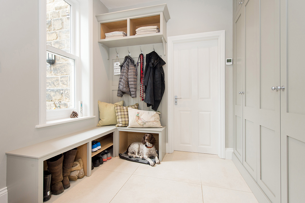 Entrance storage with a spaniel in his bed